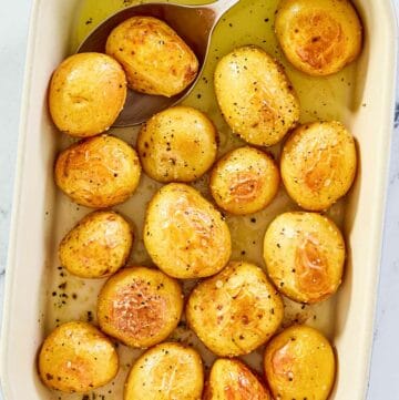 overhead view of roasted baby potatoes in a dish.