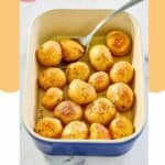 roasted baby potatoes in a blue baking dish.
