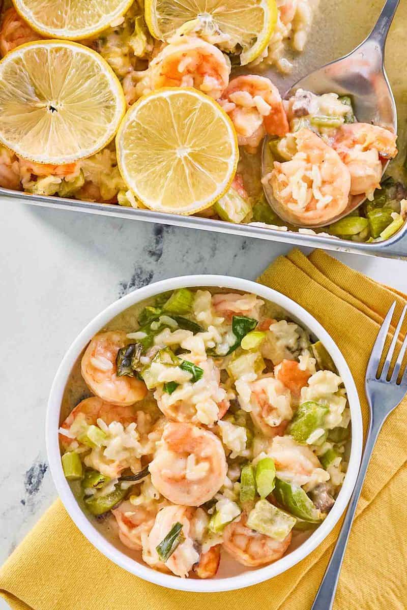 overhead view of shrimp casserole in a bowl and baking dish.