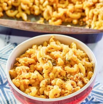spicy mac and cheese in a bowl and baking dish.