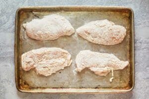 chicken breasts breaded with seasoned flour and buttermilk.