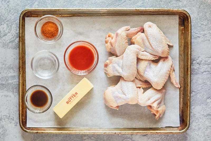 Wingstop Cajun wings ingredients on a tray.