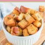 Air fryer croutons in a small white bowl.