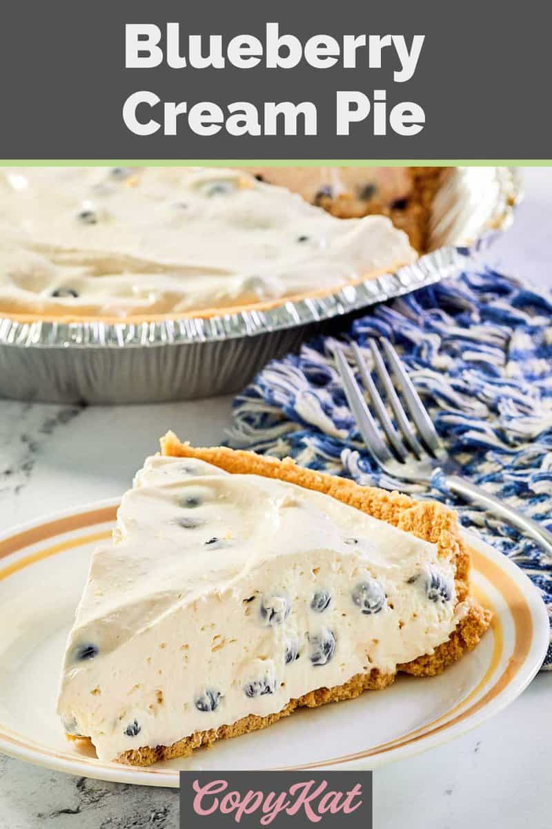 no bake blueberry cream pie with fresh blueberries on a plate.