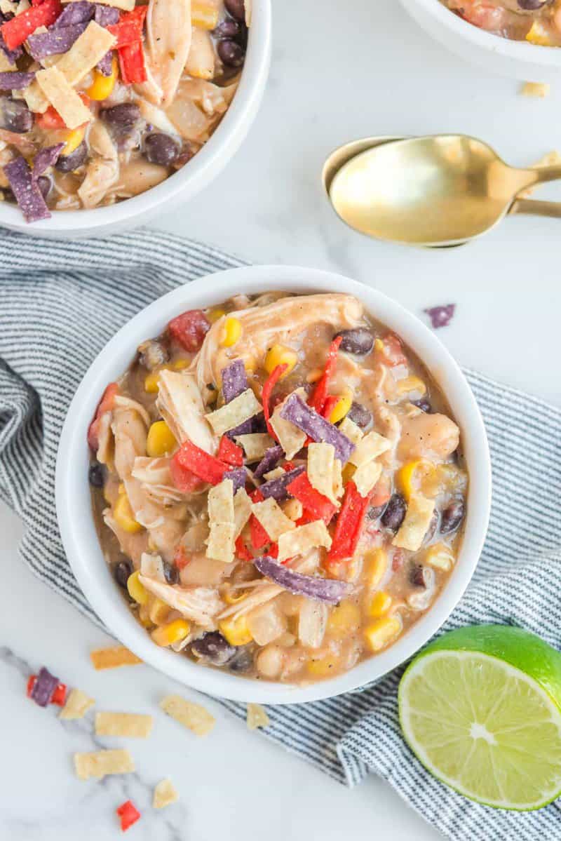 Overhead view of copycat Chick Fil A chicken tortilla soup in a white bowl.