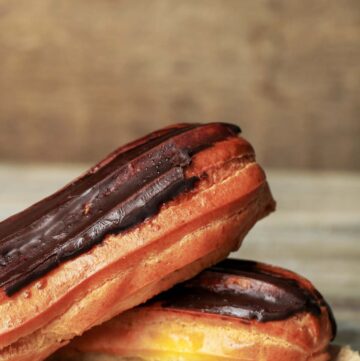 closeup of two chocolate eclairs.