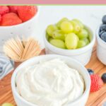 Bowls of cream cheese fruit dip and fresh fruit.