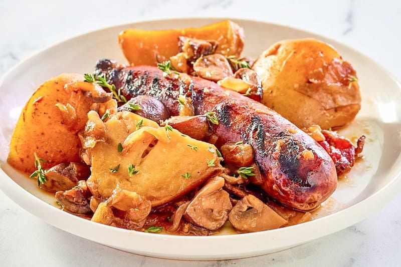 a serving of Irish coddle on a white plate.