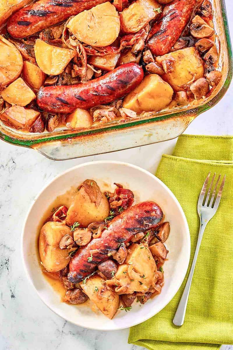 overhead view of Irish coddle in a baking dish and on a plate.