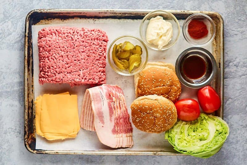 copycat McDonald's smoky BLT quarter pounder with cheese ingredients on a tray.