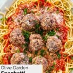 Overhead view of a platter of homemade Olive Garden spaghetti and meatballs.
