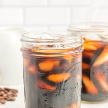 copycat Starbucks cold brew coffee with ice in a mason jar.