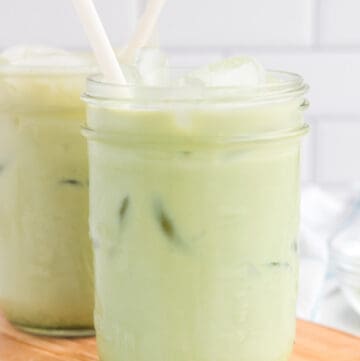 copycat Starbucks matcha latte drinks on a wood board.