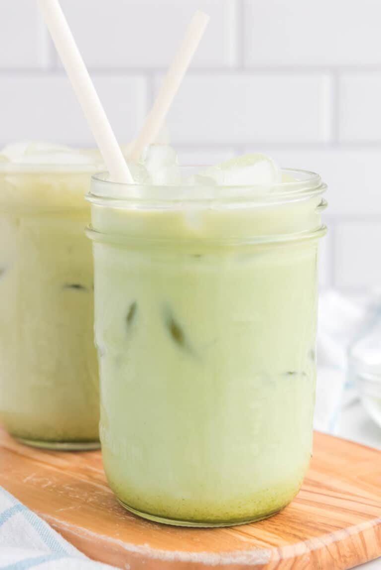 copycat Starbucks matcha latte drinks on a wood board.
