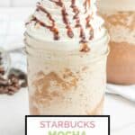 homemade Starbucks mocha frappuccino drink with whipped cream and chocolate syrup on top.