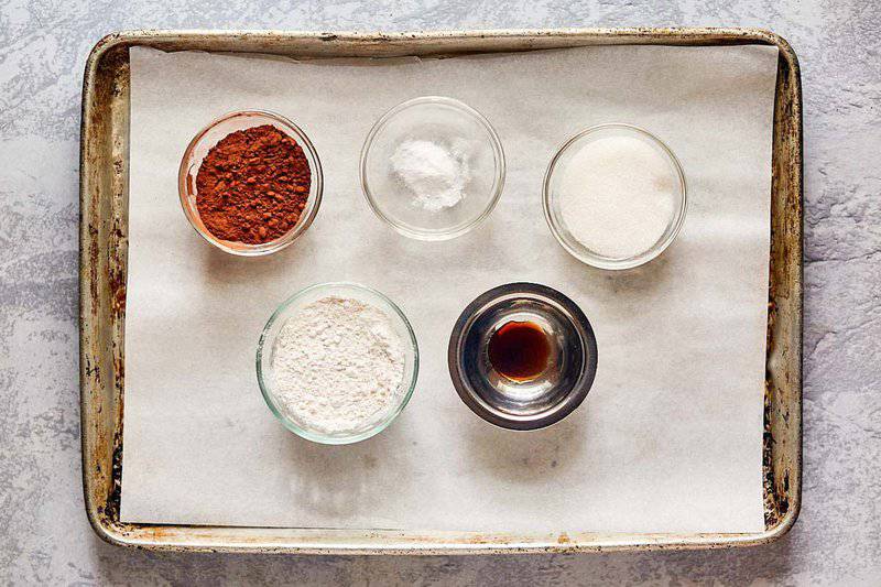 wacky cake ingredients on a tray.