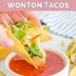 Dipping a chicken wonton taco into sweet chili sauce.