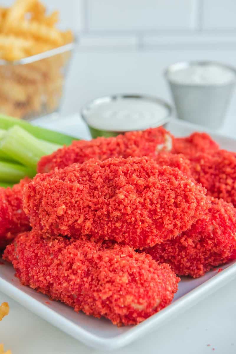 Copycat Applebee's Flamin' Hot Cheetos Wings connected  a plate.