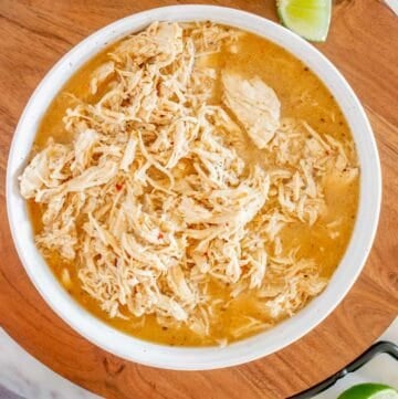 Overhead view of copycat Cafe Rio shredded chicken in a bowl.