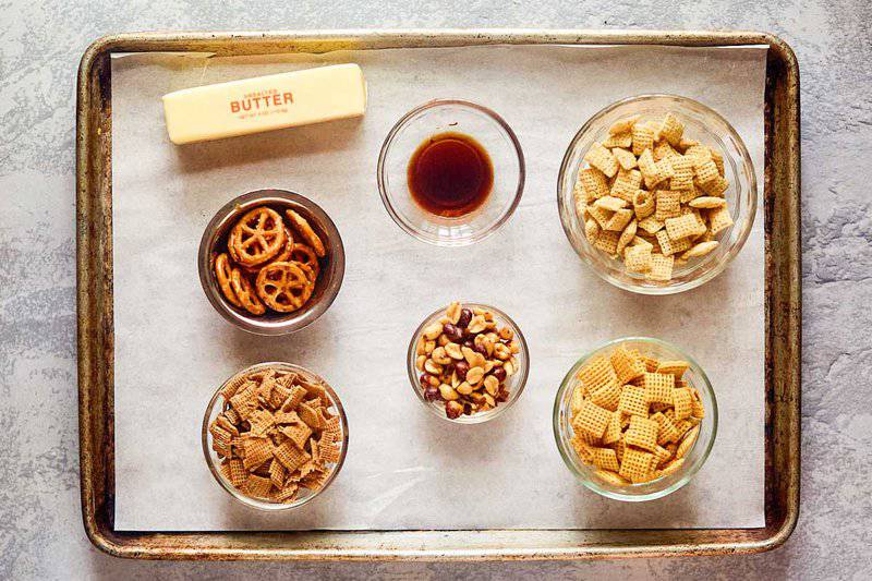 Original Chex mix ingredients on a tray.