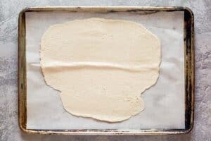 Rolled out dough for homemade crackers.