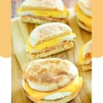 Homemade egg mcmuffins on a board.