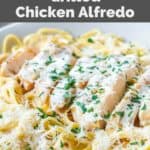 Homemade Olive Garden grilled chicken alfredo with pasta.
