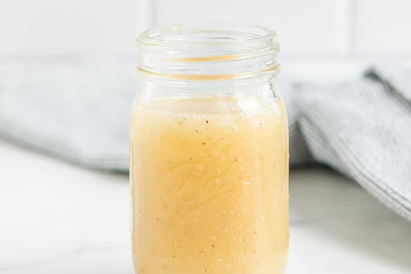 A jar of copycat Panera fuji apple salad dressing.