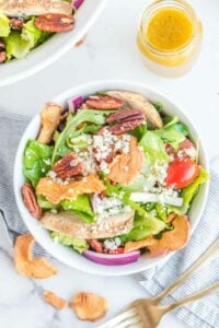 Overhead view of copycat Panera fuji apple salad in a bowl.