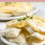 Scalloped potatoes without cheese on two plates.
