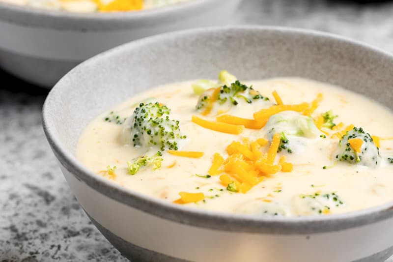 Three cheese broccoli soup in a bowl.