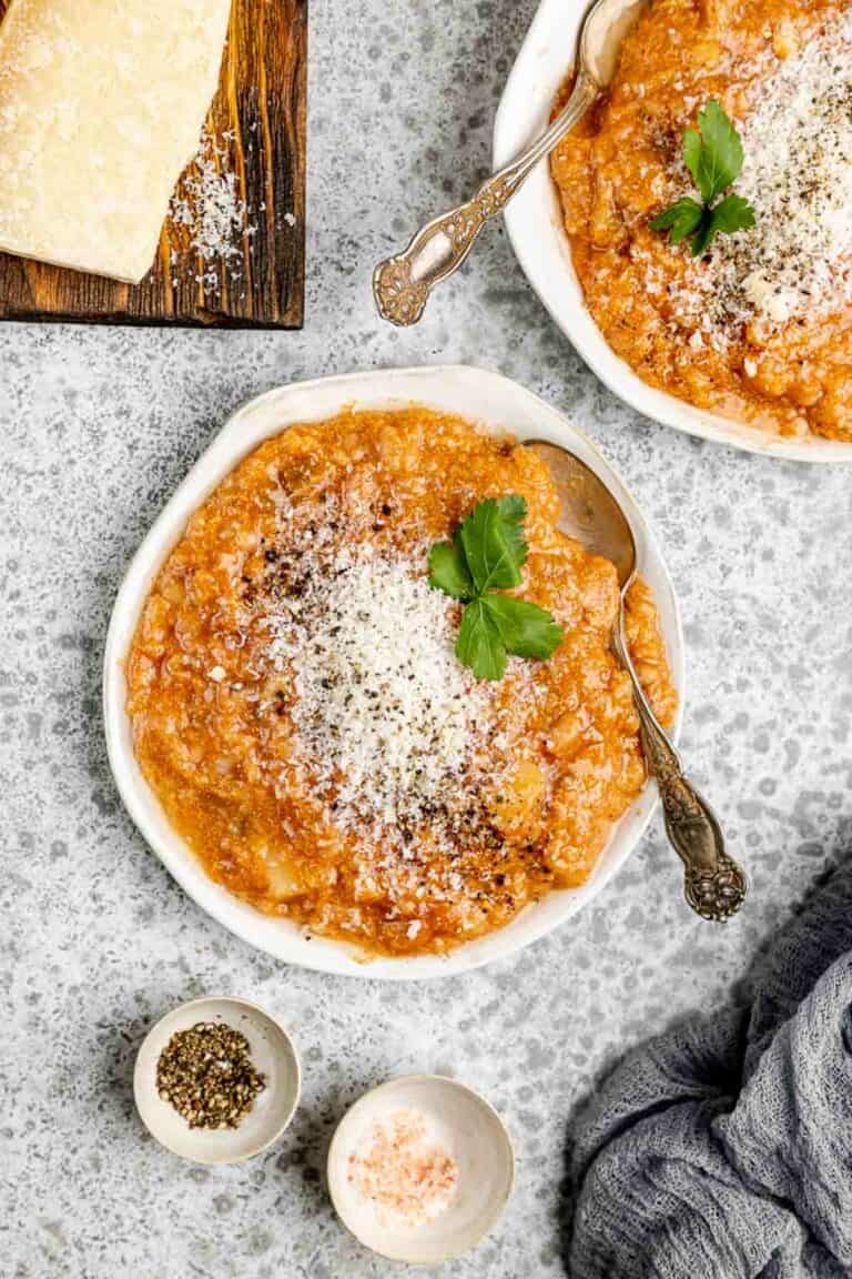 Overhead view of copycat Tosi's minestrone soup in bowls.