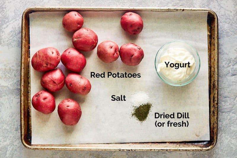 Dill potato salad ingredients on a tray.