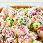 Closeup of red potato salad with dill.