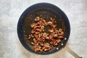 Browned ground beef with taco seasoning.