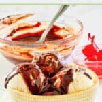 A bowl of ice cream topped with homemade hot fudge sauce.