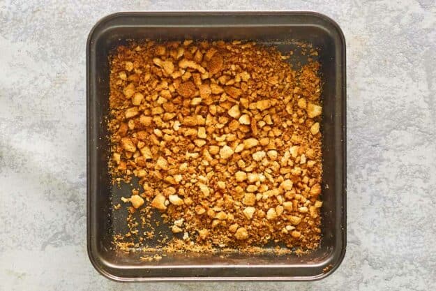 Toasted bread crumbs in a baking pan.