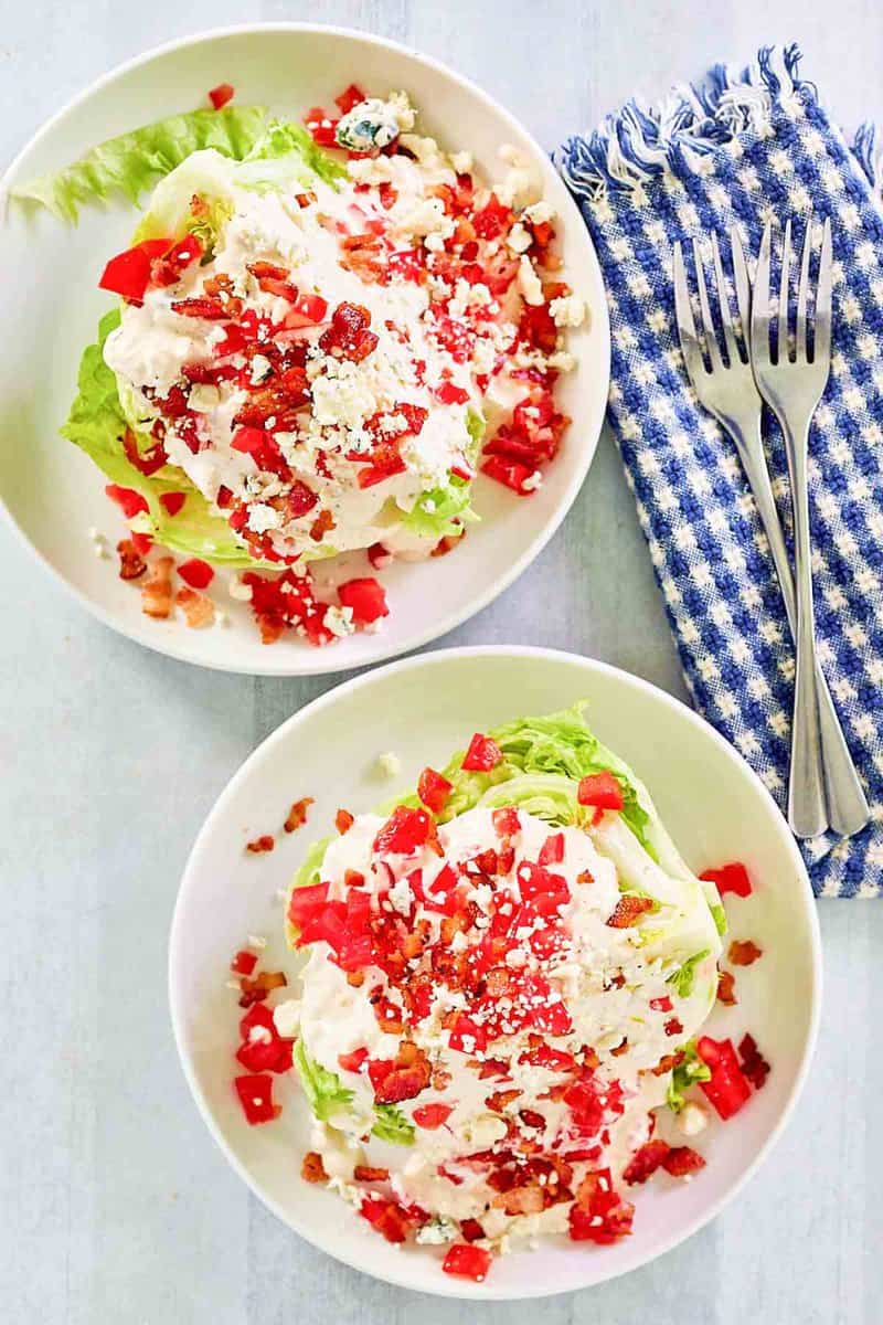 Overhead view of wedge salads with Maytag buttermilk blue cheese dressing.