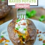 Copycat Outback Steakhouse loaded baked potato with a fork in it.