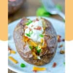 Homemade Outback baked potato loaded with toppings.