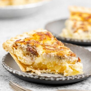 Pineapple pie slice with the pie in the background.