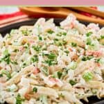 Seafood pasta salad in a large serving bowl.