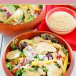 Southwestern ranch dressing in a small bowl and on salads.