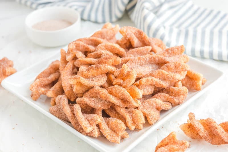 Copycat Taco Bell cinnamon twists on a white plate.