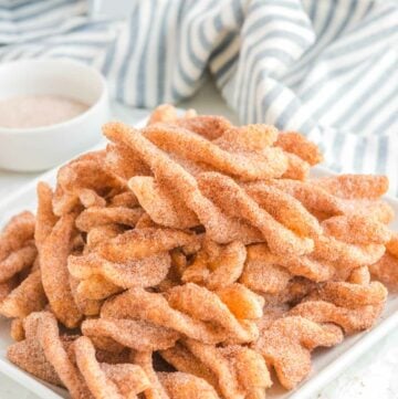 Copycat Taco Bell cinnamon twists on a plate.