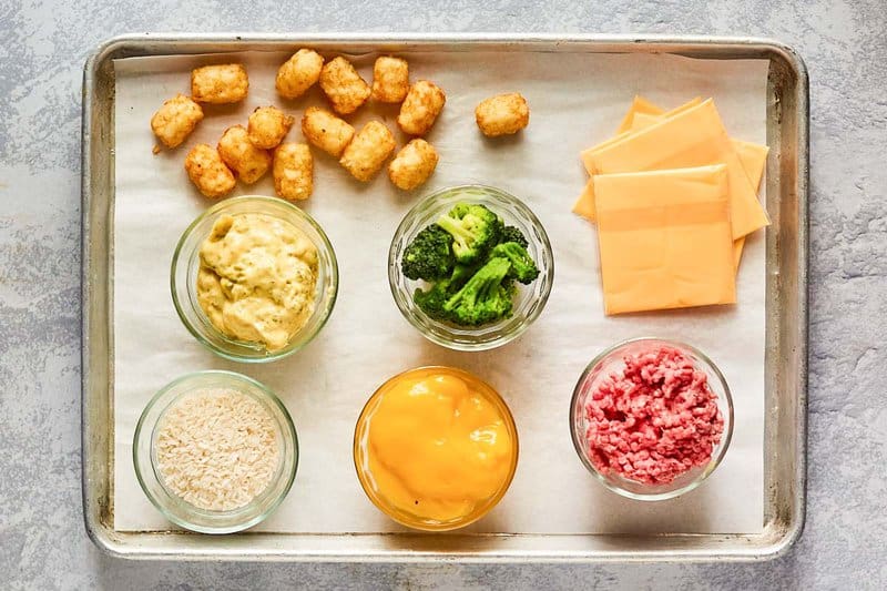 Ingredients for broccoli tater tot casserole on a tray.