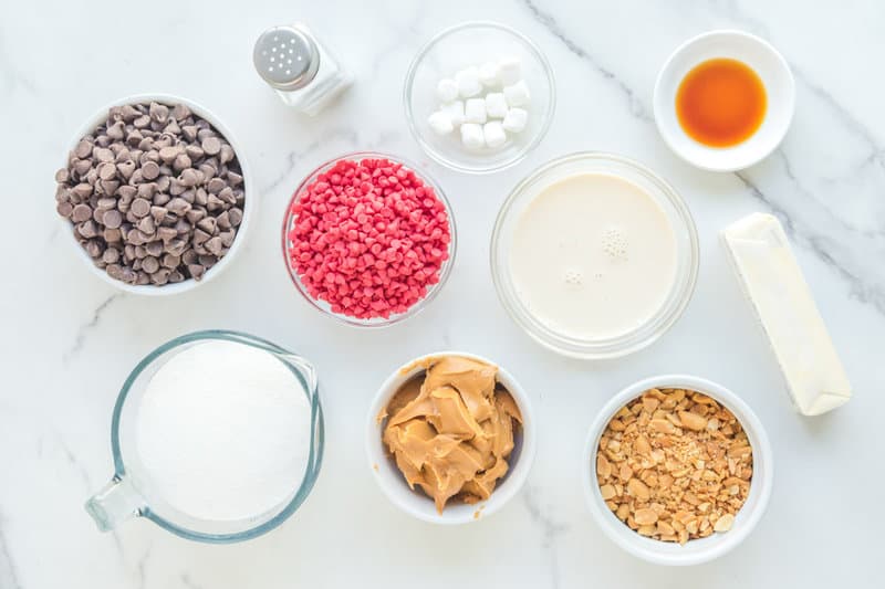 Ingredients for cherry mash bars on a marble surface.