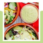 Copycat Chick Fil A avocado lime ranch dressing and two salads with it on top.