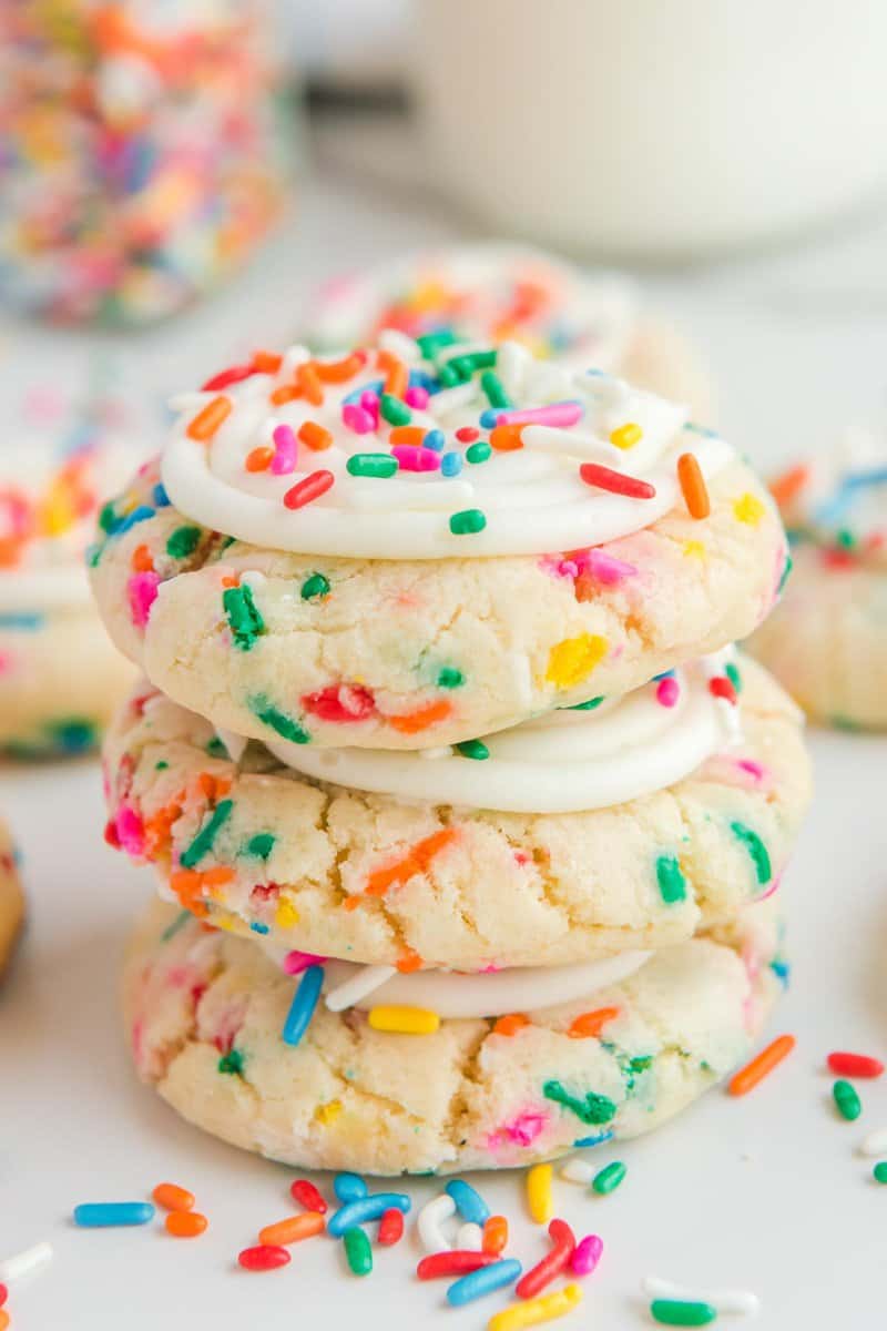 Copycat Crumbl birthday cake cookies in a stack.