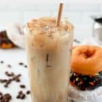 Homemade Dunkin iced coffee in a tall glass.